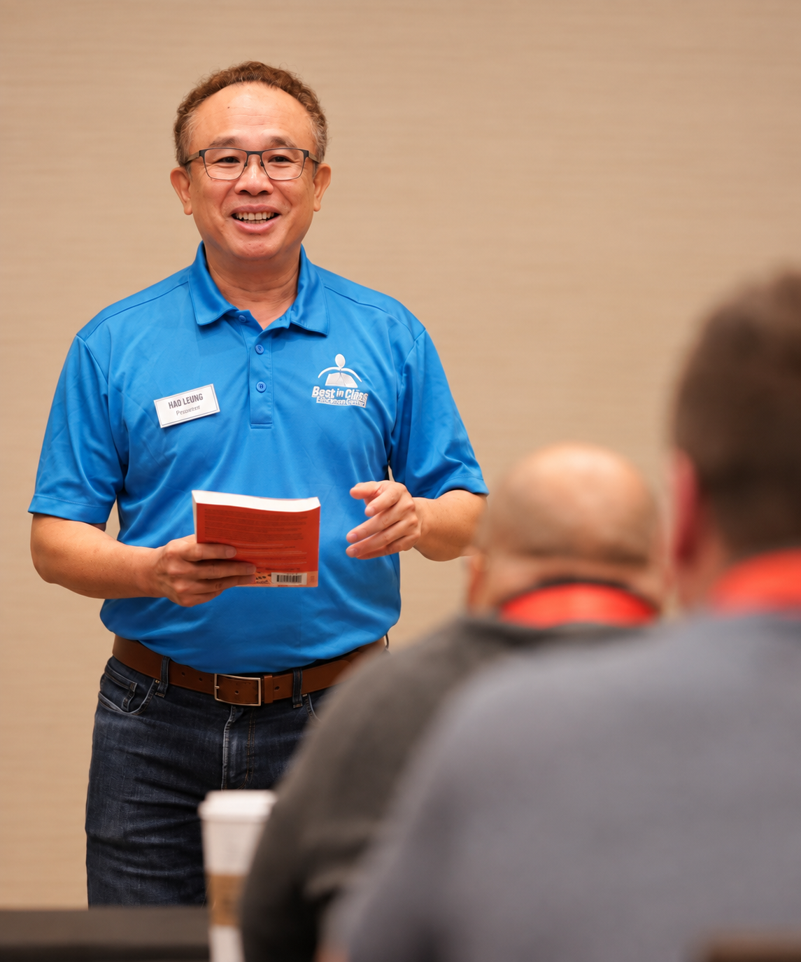 Franchise industry professional leading an educational session with attendees